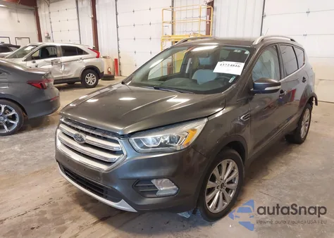 2017 Ford Escape Titanium from USA, damaged, VIN 1FMCU9J92HUA77309
